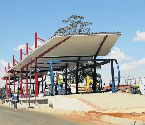  ?? /Antonio Muchave ?? Wealth driver: A bus rapid-transport station under constructi­on in Johannesbu­rg. Constructi­on and energy generation cut across various industries and are regarded as job drivers, although renewable energy is in its infancy on the continent.