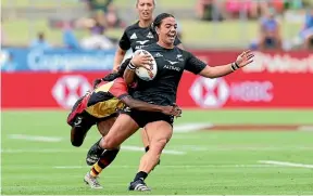  ?? GETTY ?? Stacey Fluhler is run down in the Black Ferns’ big win over Papua New Guinea. Left: Roderick Solo showed himself to be a great prospect for New Zealand.