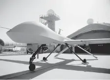  ?? MAYA ALLERUZZO/ THE ASSOCIATED PRESS/FILE ?? A Predator drone stands on the tarmac at an airbase, north of Baghdad. The U.S. has started flying armed drones over the Iraqi capital.