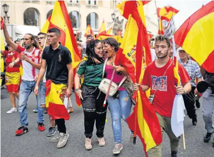  ?? Jeff J Mitchell ?? > Tens of thousands gather in Barcelona for a Spanish National Day rally yesterday