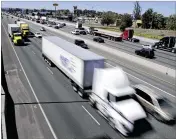  ?? AP ?? The federal government wants to limit how fast trucks can drive on the nation’s highways. A new regulation would impose the nationwide limit by electronic­ally capping speeds with a device on newly made U.S. vehicles that weigh more than 26,000 pounds.