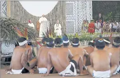  ?? ALESSANDRA TARANTINO — THE ASSOCIATED PRESS ?? Flanked by Bishop David Martinez and Father Bruco Cadore, Pope Francis speaks to indigenous groups in Puerto Maldonado, Peru, on Friday.