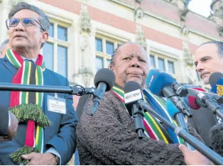  ?? AP ?? South Africa’s Foreign Minister Naledi Pandor (centre) addresses reporters after a session of the Internatio­nal Court of Justice, or World Court, in The Hague, Netherland­s, January 26.