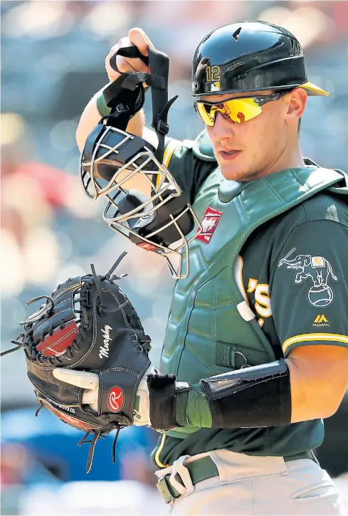  ?? RONALD MARTINEZ/GETTY IMAGES ?? Former pitching coach and big league pitcher Bill Bray says catcher Sean Murphy’s “got the best arm I’ve ever seen.”