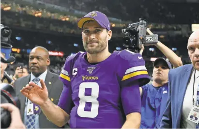  ?? CHUCK COOK/USA TODAY SPORTS ?? Quarterbac­k Kirk Cousins reacts after earning his first NFL playoff victory, leading the Vikings past the host Saints in overtime in an NFC wild card game.