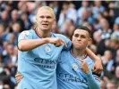  ?? Photograph: Peter Powell/EPA ?? Erling Haaland and Phil Foden both scored hat-tricks for Manchester City in the derby.