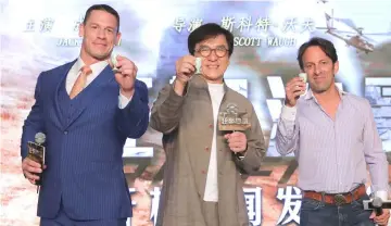  ?? — Photo courtesy of the Shanghai Internatio­nal Film Festival ?? (From left) Cena, Jackie Chan and Scott Waugh in Shanghai.