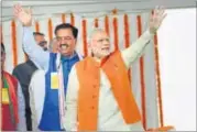  ??  ?? The Prime Minister (right, along side UP BJP chief KP Maurya) also made a developmen­t pitch during a rally in Moradabad. HT PHOTO