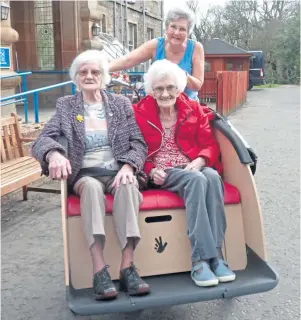  ??  ?? JAUNT: Nancy and Janet on the trishaw – a combinatio­n of tricycle and rickshaw