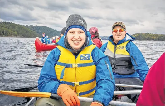  ?? SUBMITTED/TIP OF THE TOES FOUNDATION ?? Roxanne van Velzen takes a break from paddling to pose for a photo during her recent venture to the Poisson Blanc Reservoir, a camp for cancer survivors in the Outaouais region near Saguenay, Quebec.