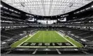  ??  ?? The Las Vegas Raiders played in front of empty seats in their new stadium due to the Covid-19 pandemic. Photograph: Isaac Brekken/AP