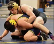  ?? KYLE FRANKO — TRENTONIAN FILE PHOTO ?? Jacob Venezia, right, helped Hopewell Valley cruise to a quad meet sweep.