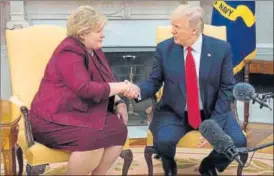  ?? AFP ?? ▪ US President Donald Trump shakes hands with Norwegian Prime Minister Erna Solberg.