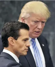  ?? YURI CORTEZ / AFP / GETTY IMAGES FILES ?? The White House aims to have the new trade deal signed by Mexican President Enrique Pena Nieto, left, before his recently elected successor takes office on Dec. 1.