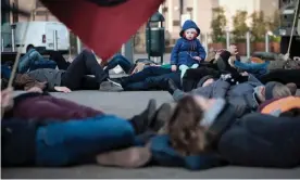  ??  ?? Climate protesters outside the EU parliament in Brussels demand it declares a climate emergency. Photograph: Olivier Hoslet/EPA