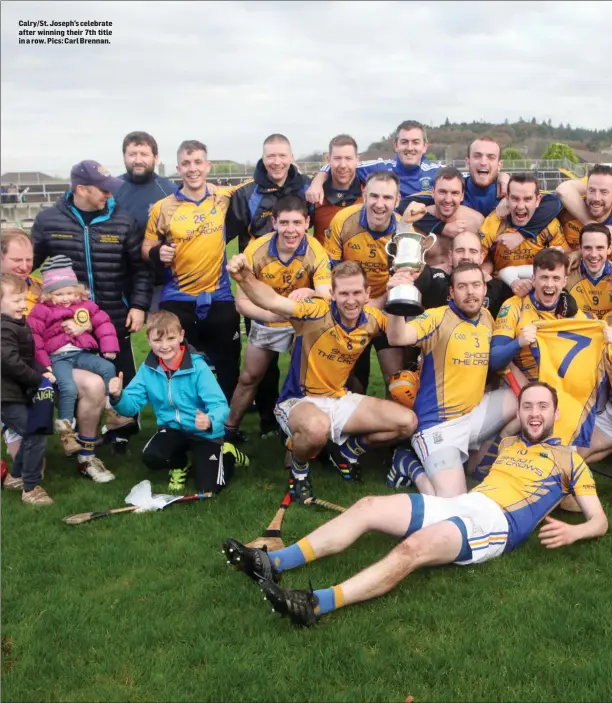  ??  ?? Calry/St. Joseph’s celebrate after winning their 7th title in a row. Pics: Carl Brennan.