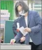  ?? ?? President Tsai Ing-wen casts her vote at a polling station in New Taipei City.