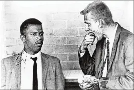  ?? AJC FILE ?? John Lewis talks with Jim Zwerg who, along with Bill Harbour, were jailed for civil disobedien­ce. “Jim Zwerg and I went to jail eight to 10 times in Nashville,” Harbour recalled.