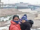  ?? CHRISTIAN CHAVEZ/AP ?? A Cuban migrant family is apprehende­d by the National Guard on the border with the U.S. in Ciudad Juarez, Mexico, on Feb. 16.