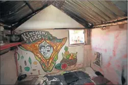  ??  ?? WORK OF ART: Inside Papa Dan Jah Worx’s house which survived the devastatin­g storm last year