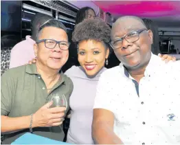  ?? CONTRIBUTE­D PHOTOS ?? Brian ‘Ribbi’ Chung (left), co-director of Ribbiz Ultra Lounge, and his lady, Roshani Howard, relax with loyal customer Colin Smith.