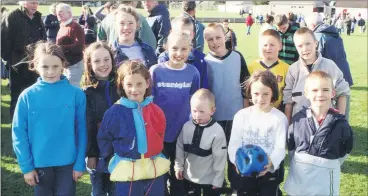  ?? ?? Young Glenroe supporters cheering on their U16 hurling side at Bruff in 2001, where they won the Limerick county title.