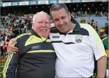  ??  ?? Kerry team kit men Vincent Linnane, left, and Niall O’Callaghan celebrate after the 2014 All Ireland SFC Final win over Donegal.