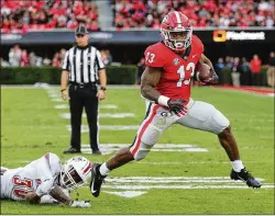  ?? CURTIS COMPTON / CCOMPTON@AJC.COM ?? UGA running back Elijah Holyfield rushed 159 times for 1,018 yards and scored seven touchdowns in a breakout junior season.