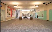  ?? DANIELLE RAY — SENTINEL & ENTERPRISE ?? The Mall at Whitney Field in Leominster was renovated with new carpeting and lighting, an investment made in 2022 by owner Hull Property Group to attract new tenants.