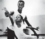  ?? AL DIAZ Archived by Flashback Miami ?? Tenya Overton, 8, with dance instructor Chris McKennon at the Model City Cultural Art Center in 1984.