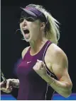  ??  ?? Elina Svitolina celebrates after her victory on Thursday