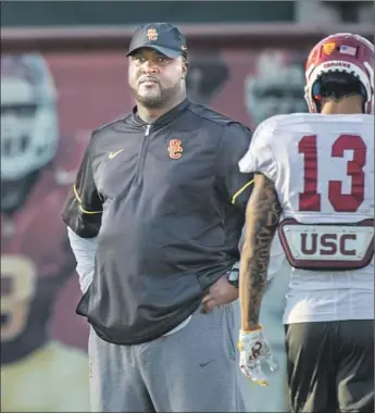  ?? Brian van der Brug Los Angeles Times ?? DESPITE A RECENT change in coaching responsibi­lities at USC, Tee Martin is taking the high road, telling his family that “no matter what you hear, just know that I’m going to be fine.”