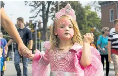  ?? PHOTOS BY JULIE JOCSAK/STANDARD STAFF ?? Lili Duquette dresses as an underwater sea princess of the Grand Banks during the Pied Piper Parade. Children dressed up and went for a short stroll around downtown St. Catharines during the annual parade as part of the Niagara Grape and Wine Festival...