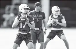  ?? AL DIAZ adiaz@miamiheral­d.com ?? Peyton Matocha (17) is among the young quarterbac­ks who are showing promise during spring practice while starter D’Eriq King rehabs from a torn ACL.