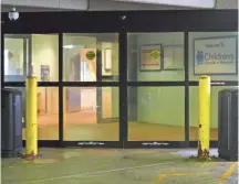  ?? COURTESY LANGLOIS FAMILY ?? The doors at Children’s Hospital of Wisconsin leading from the parking structure to the skywalk. Countless parents, both hopeful and grieving, have passed through these doors.