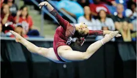  ?? [AP PHOTO] ?? After a surprising second-place finish in the team competitio­n, OU sophomore Maggie Nichols is already planning a comeback for next year.