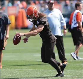  ?? TIM PHILLIS — FOR THE NEWS-HERALD ?? Jamie Gillan punts during training camp July 27.