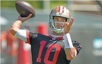  ?? TONY AVELAR/AP ?? Quarterbac­k Jimmy Garoppolo had a rough practice Wednesday with the 49ers.