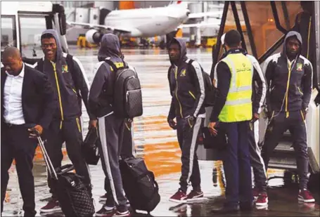  ??  ?? Cameroonia­n players and officials on arrival in Moscow yesterday