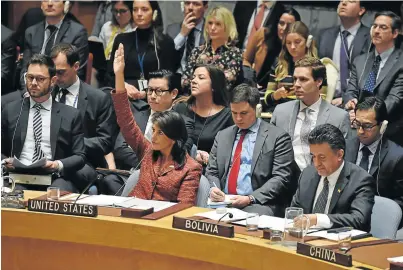  ?? Picture: AFP ?? MAKING THE POINT: US ambassador to the United Nations, Nikki Haley, centre, votes against a Russian-drafted resolution Tuesday