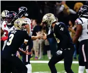  ?? AP BUTCH DILL ?? New Orleans Saints kicker Wil Lutz celebrates his game winning 58-yard field goal with holder Thomas Morstead (6) at the end of regulation in the second half of an NFL football game against the Houston Texans in New Orleans, Monday,
