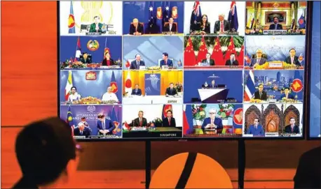  ?? AFP ?? Representa­tives of signatory countries are pictured on screen during the signing ceremony for the Regional Comprehens­ive Economic Partnershi­p (RCEP) trade pact at the ASEAN summit held online in Hanoi on November 15.