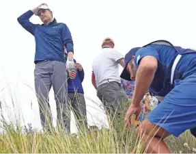  ?? THOMAS J. RUSSO, USA TODAY SPORTS ?? Jordan Spieth’s wayward tee shot landed in the deep rough of the 13th hole.