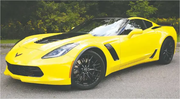  ?? PHOTOS: CLAYTON SEAMS/DRIVING ?? The Chevrolet Corvette Z06 is a feast for the eyes with sharp corners trimmed with black aerodynami­c bits. The wings, scoops and vents are all real.