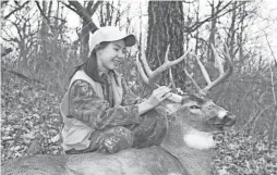  ?? PAUL A. ?? Carcass tags, such as the green one attached to the antler of this buck shot in 2011 by Phelan Purnell of Oconomowoc, are no longer required in Wisconsin.