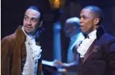  ?? DISNEY+ ?? “Hamilton,” with Lin- Manuel Miranda ( left) and Leslie Odom Jr., was the best of this year’s many musicals.