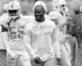  ?? JOHN MCCALL/SUN SENTINEL ?? Dolphins coach Brian Flores before Miami’s game against the Jets at Hard Rock Stadium on Nov. 3.