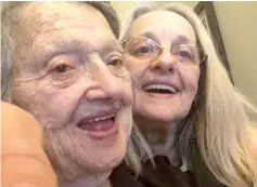  ??  ?? This handout photo provided by Connie Moultroup (right) shows her taking a selfie with her mother Genevieve Purinton after reuniting thanks to DNA testing. — AFP photo