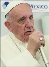  ??  ?? Morals: Pope Francis faced questions on virus