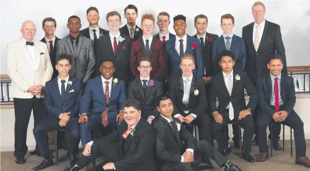  ??  ?? FROM BOYS TO MEN: St Augustine's College Year 12 François Residence boarding dormitory members ready to go to the school formal pictured with Andrew Dorahy, Head of Senior School (left) and David Lawrence, Head of François residence.